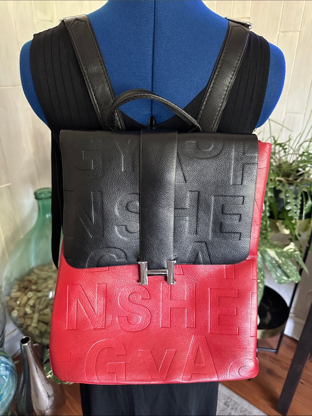 Two-Tone Black and Red Leather Backpack with H-Clasp